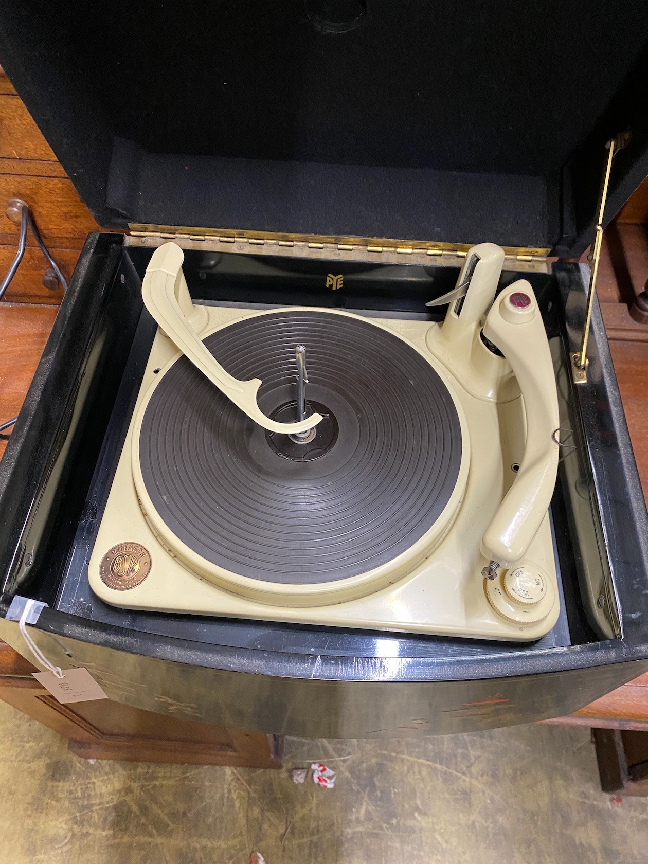 A 1960's chinoiserie lacquer Pye record player, width 43cm